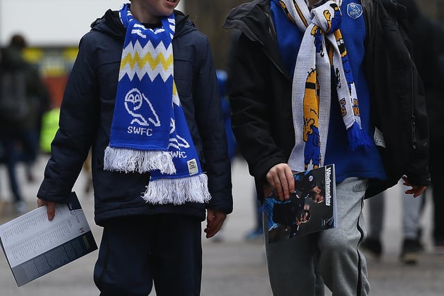 Two young Wednesday supporters arrive for the FA Cup third round tie against Fulham at Hillsborough in January 2016.