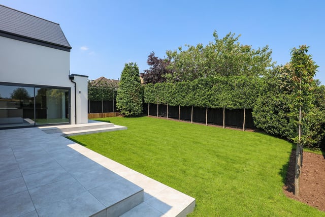 Here are the landscaped gardens with terrace and lawns.