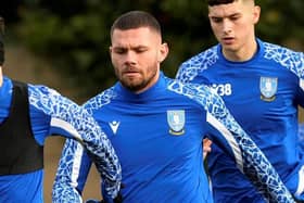 Former Sheffield Wednesday defender Harlee Dean has been linked with a return to the club.