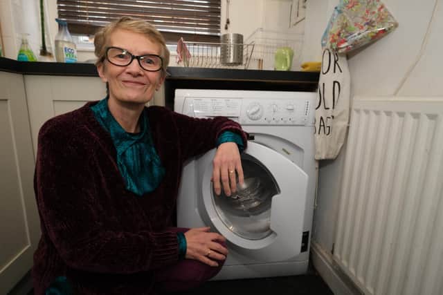 Jane North has been reunited with her precious engagement ring after it went missing for more that three years - only for it to turn up in her washing machine.