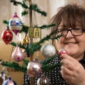 Sheffield resident Kay Ashton, 60, with her 1920's Christmas tree.