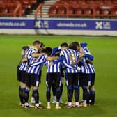 Sheffield Wednesday's team huddle prior to kick off at Nottingham Forest last night - another match that ended in defeat.      Pic Steve Ellis