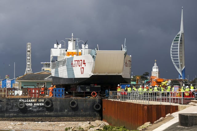 LCT 7074 with Spinnaker Tower and stormy skies in the background. Picture: Steve Parsons/PA Wire