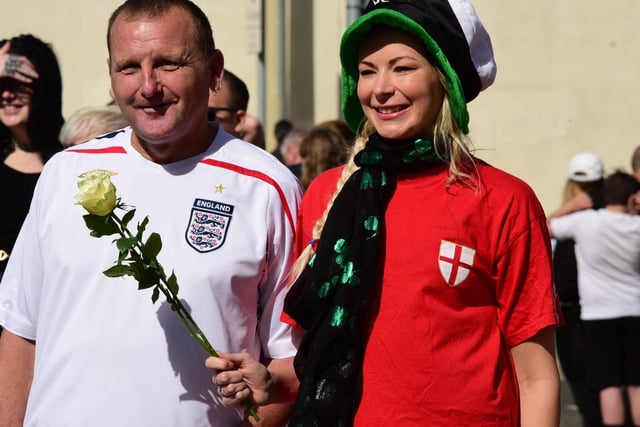 Two mourners wore England football shirts in honour of his World Cup winning heroics with the national side in 1966.