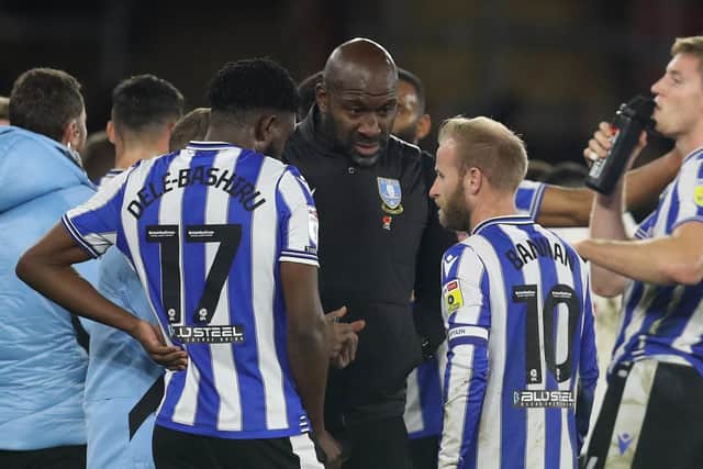 Sheffield Wednesday trio Barry Bannan, Fisayo Dele-Bashiru and Darren Moore talk tactics during their Carabao Cup clash at Southampton earlier this month.
