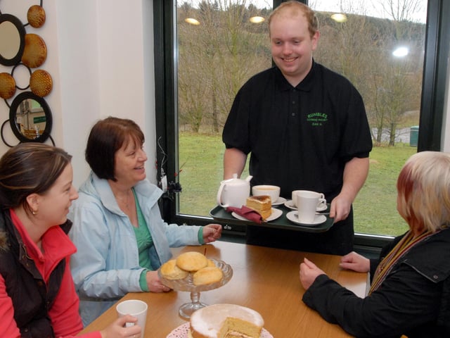 Student Daniel Hucknall served coffee and cake at Rumbles cafe in Clipstone in 2009