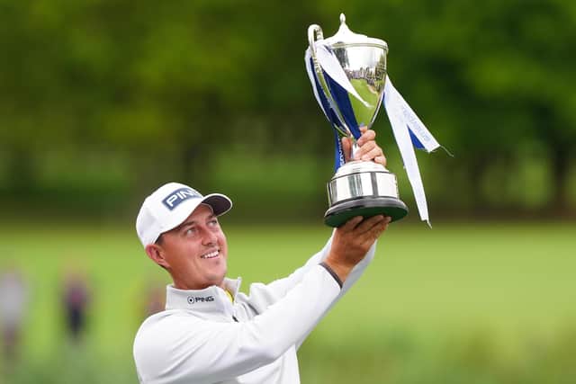 Joe Dean celebrates with the trophy after day four of the Husqvarna British Masters at The Belfry Hotel & Resort, Sutton Coldfield. (Picture: PA)