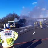 Firefighters battle a crane fire on the M1 near Sheffield. Image courtesy of South Yorkshire Fire and Rescue.