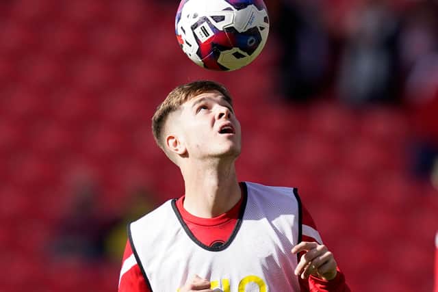 James McAtee of Sheffield United warms up ahead of the game against Stoke City: Andrew Yates / Sportimage