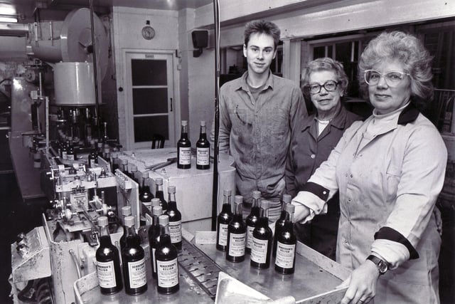 Owner Constance Freeman, centre, with manager Kathleen Spivey and maintenance engineer Duncan Gillespie on the Henderson's Relish bottling line on March 17, 1987