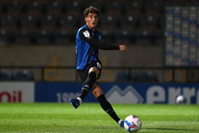 Brighton youngster Haydon Roberts - a target for Sheffield Wednesday - spent time in League One on loan at Rochdale.