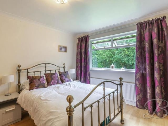 The second bedroom is equally attractive. Again it has laminate flooring and fitted wardrobes.