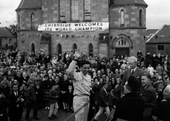 World champion F1 racing driver Jim Clark drove through the borders on an open top bus to meet the crowds, September 1965.
