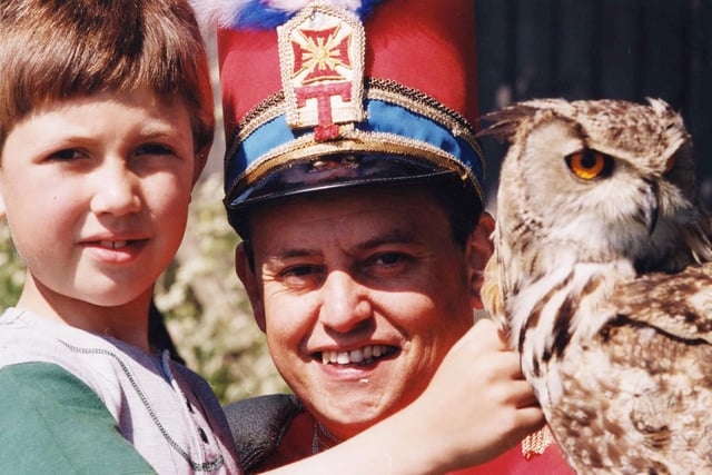 Eagle Owl Bonny Lass got plenty of attention at the Brinkburn Community Association's open day in 1996, including from Tommy the Trumpeter and youngster Blake Gustafson.