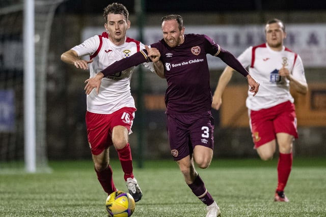 Aidy White competes with Ross Davidson during the Betfred Cup match between East Fife and Hearts at Bayview Stadium.  (Photo by Ross Parker/SNS Group)