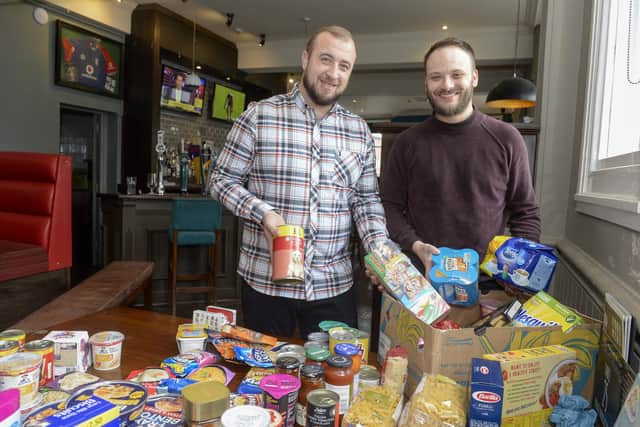 Dave Leasley and Damian Chapman at the Loxley Sports Bar & Grill. They have started a food bank for the needy and elderly during the COVID-19 outbreak. Picture: Dean Atkins