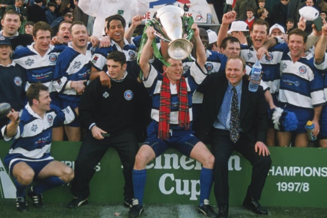 Bath captain Andy Nicol dons a tartan scarf to celebrate alongside coach Andy Robinson and team-mates after the 19-18 win over Brive in the 1998 Heineken Cup final at the Lescure Stadium in Bordeaux.