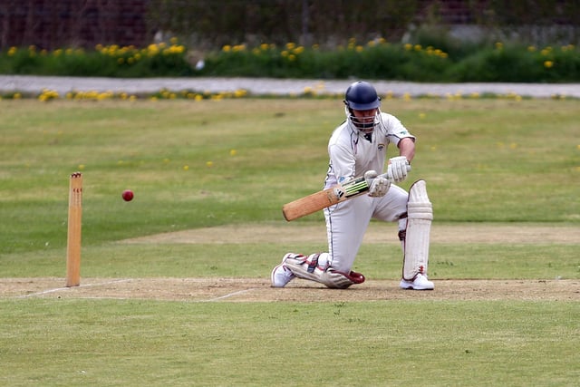 New Mills batter Callum Firth in a game against Hadfield.