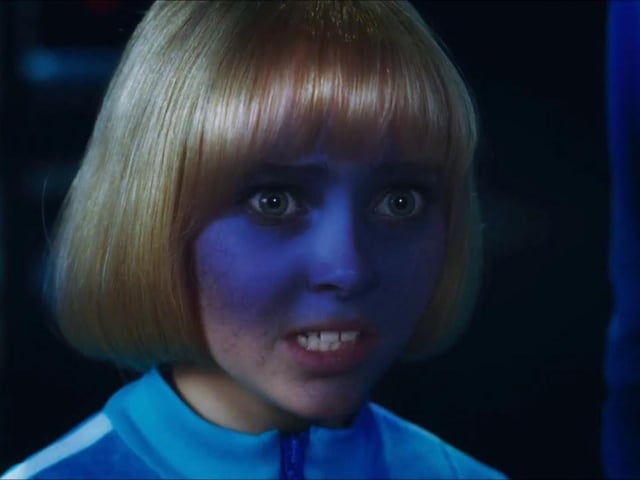 Transform into the bubblegum-eating Violet Beauregarde from Roald Dahl’s Charlie and the Chocolate Factory by dusting purple eye shadow or face paint over your nose and slightly towards your cheeks. Add a cropped blonde wig, if you have one, and start chewing some gum.