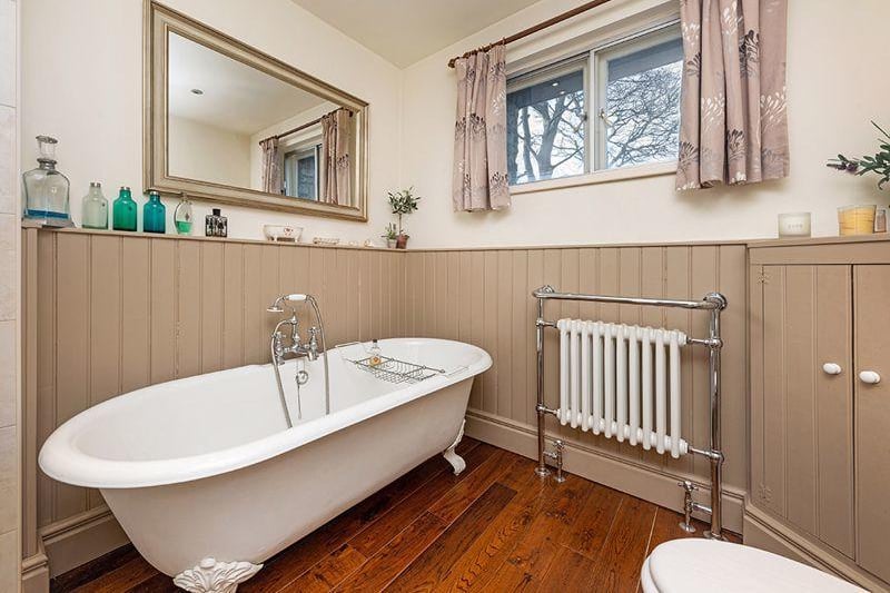 The stand alone bath offers a touch of luxury to the family suite.