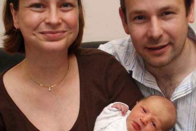 Jane and Dale Hubbuck, of Dronfield, with their baby who was born on New Year's Day in 2008.
