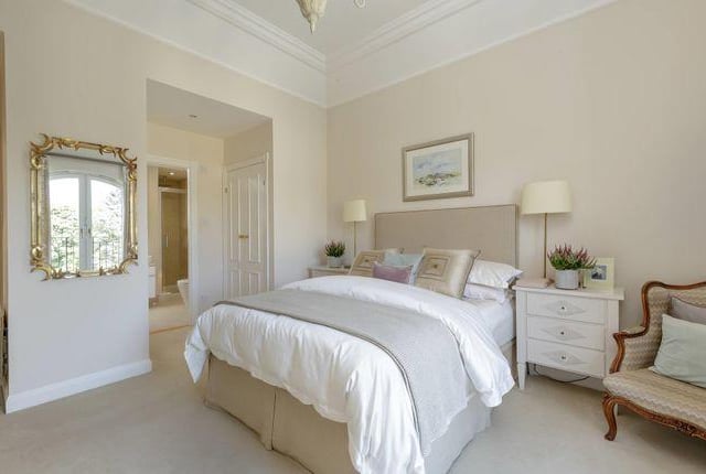 The master bedroom is generously proportioned and boasts a smart en suite bathroom. There are also two further double bedrooms, both with en suite shower rooms.
