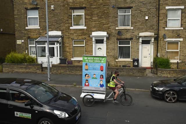 Residents urged to answer knock at their door (Photo by Oli SCARFF / AFP) (Photo by OLI SCARFF/AFP via Getty Images)