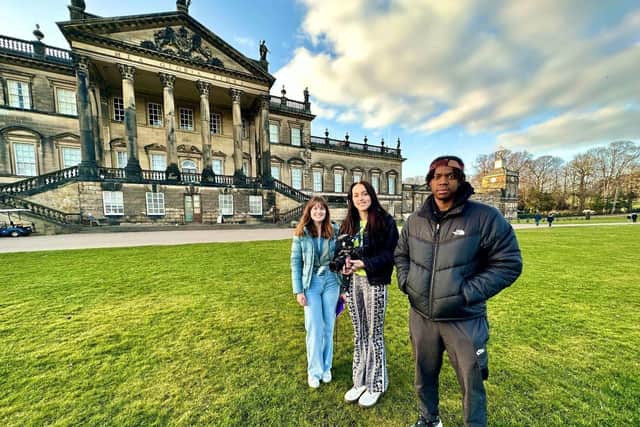 Pictured on Wentworth Woodhouse's East Front are Young Producers  L-R Sophie Ellingham, Suzie Campbell, Tinashe Musaka
