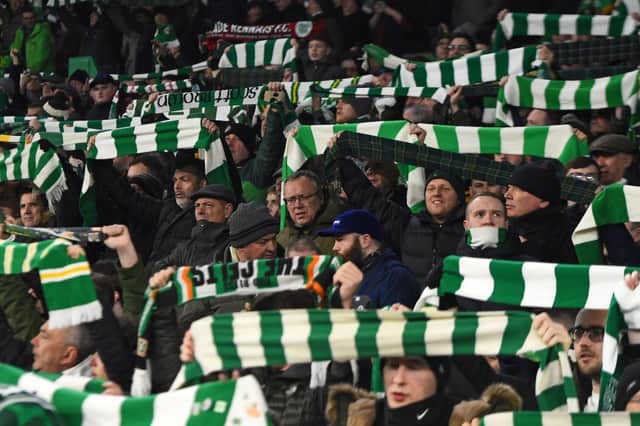 Celtic fans. (Photo by ANDY BUCHANAN/AFP via Getty Images)
