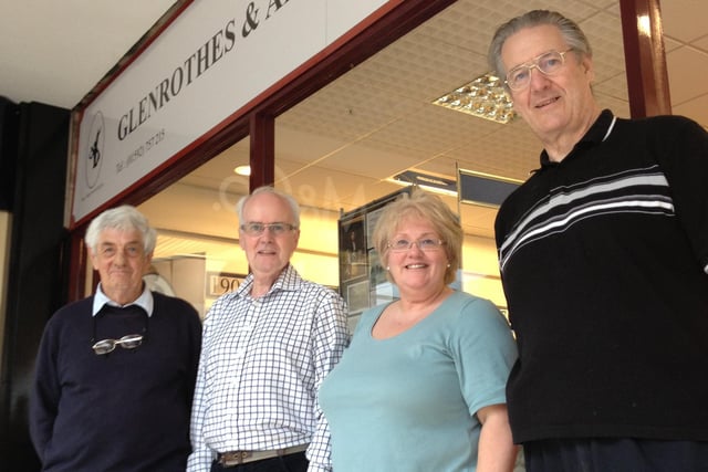Glenrothes Heritage Centre trustees outside the new unit in the Kingdom Shopping Centre after announcing their official public opening in November, 2013