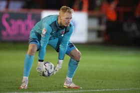 Sheffield Wednesday goalkeeper Cameron Dawson has earned huge plaudits while on loan at Exeter City.