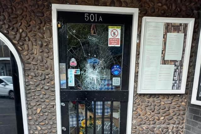 The front door of the cafe was smashed in the early hours of Friday morning.