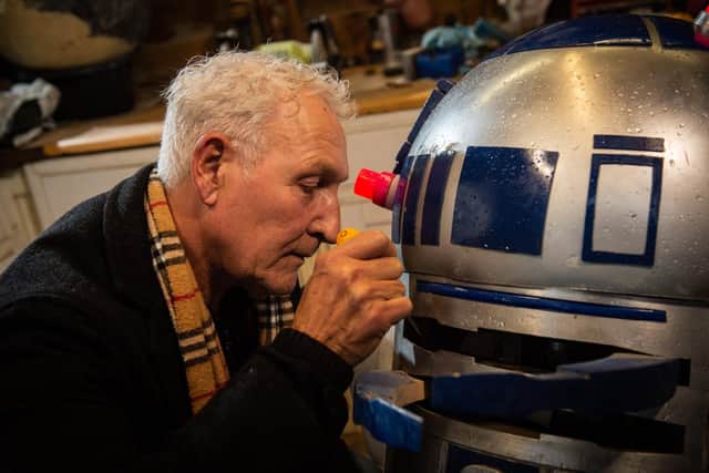 Former Sheffield DJ and Star Wars superfan Ricky Butler built a fully working model of the film’s ‘droid’ R2D2. Pictures: SWNS