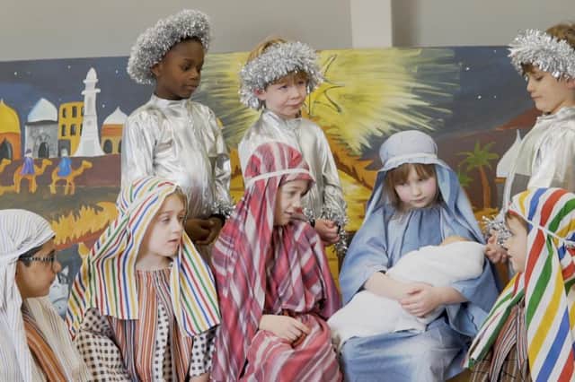 Mary and Joseph with the angels and shepherds at Birkdale Prep School's 2020 Nativity.