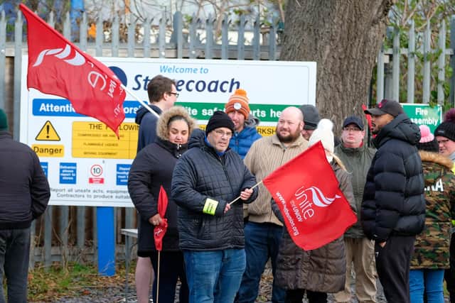 Members of Unite picket the Stagecoach depot at Ecclesfield, Sheffield, as the drivers strike over pay