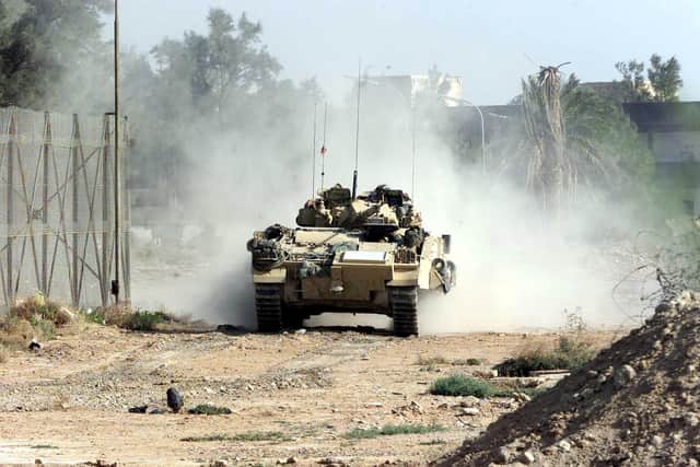 A tank patrol near Basra, Iraq, in April 2003