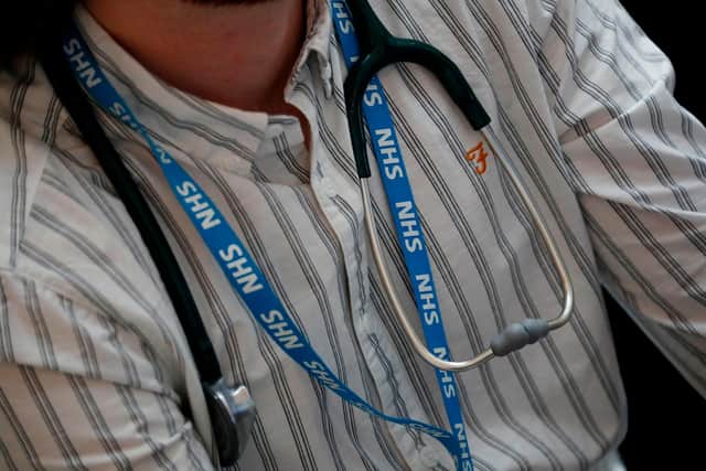 Sheffield Clinical Commissioning Group said plans to merge care services will involve closing down GP sites meaning some patients will need to travel further for services. Photo by: Tolga AKMEN / AFP