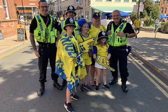 Police pose for picures wirh Sweden fans