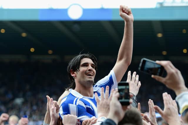 Miguel Llera celebrates with Sheffield Wednesday fans after winning automatic promotion back into the Championship in 2012.  (Photo by Gareth Copley/Getty Images)