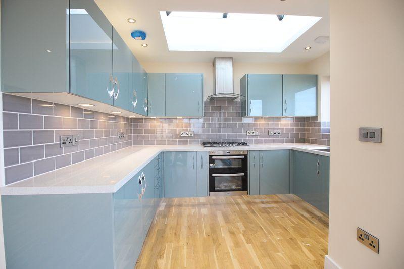 Sea and scenic views from the modern-style, fitted kitchen with Quartz work surfaces and a full range of integrated appliances.