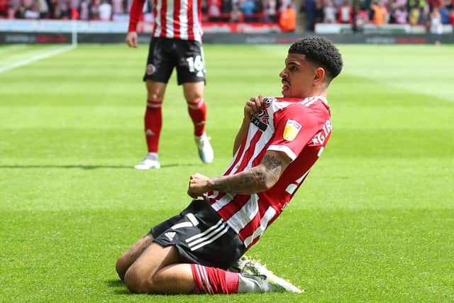 Morgan Gibbs-White slides to his knees after opening the scoring for Sheffield United: Simon Bellis / Sportimage