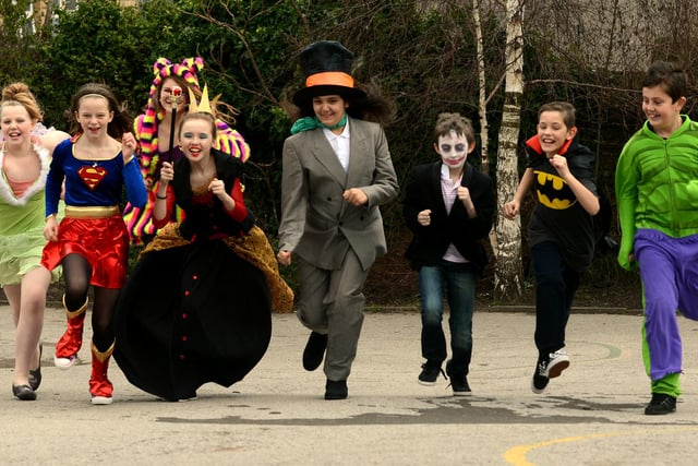 Pupils from Rivelin Primary School, Sheffield dress as heroes and villains for World Book Day 2014