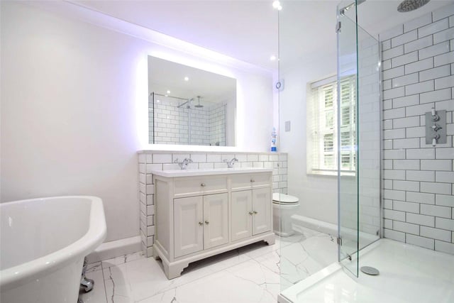 Six modern fitted bathrooms are located around the home, including a recently fitted family bathroom which comprises a three-piece white suite with a stand-alone bath, a walk-in shower and marble effect flooring.