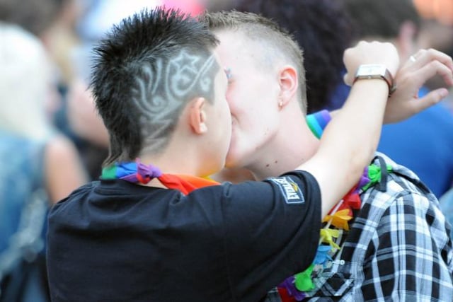 A kiss in the crowds of the 2010 pride event.