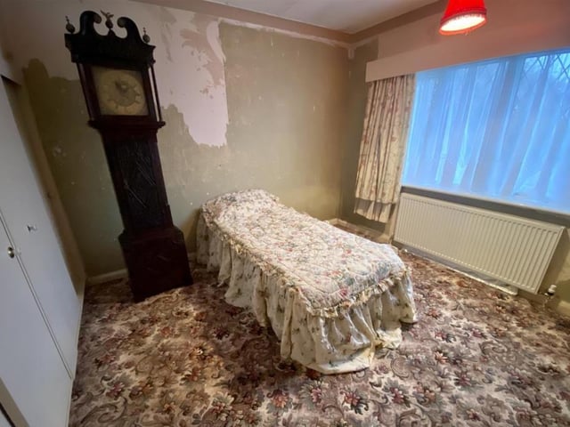 The second bedroom in the Dorchester Drive bungalow is about the same size as the master. It also has a radiator and a uPVC window to the front.