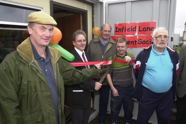 Pictured  at the Infield Lane allotments society, which won £4,300 of lottery funds. Seen is Kean Hall President of the Sheffield Allotments Federation, as he cut the ribbon to open the new area provided by the funds. With him are members of the society