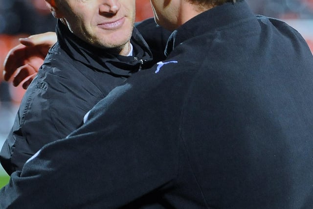 Lee Bullen and Neil McFarlane embrace before the Bairns coach moves on to Sheffield