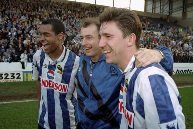 Trevor Francis embraces 1993 strike duo Mark Bright and David Hirst.