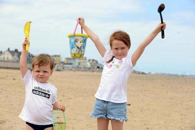 Three year-old Rory Lucas and his six-year-old sister Olivia enjoyed building sandcastles.