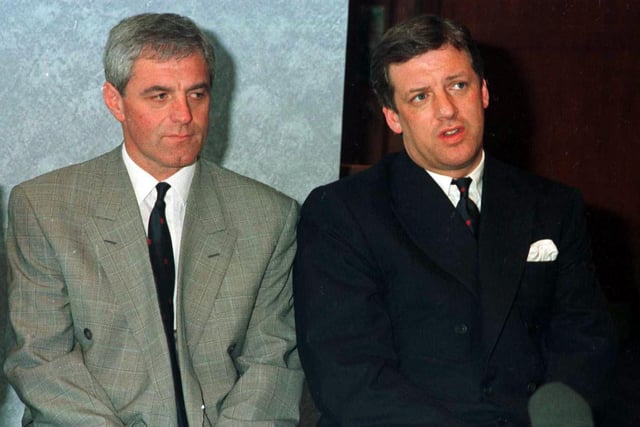 Smith sits with chairman David Murray after taking over from Souness, who decided to leave for Liverpool.